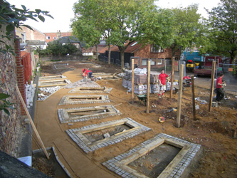 Grapes Hill Community Garden - Putting in block paving and uprights for pergola