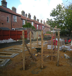 Grapes Hill Community Garden - Putting in block paving and uprights for pergola